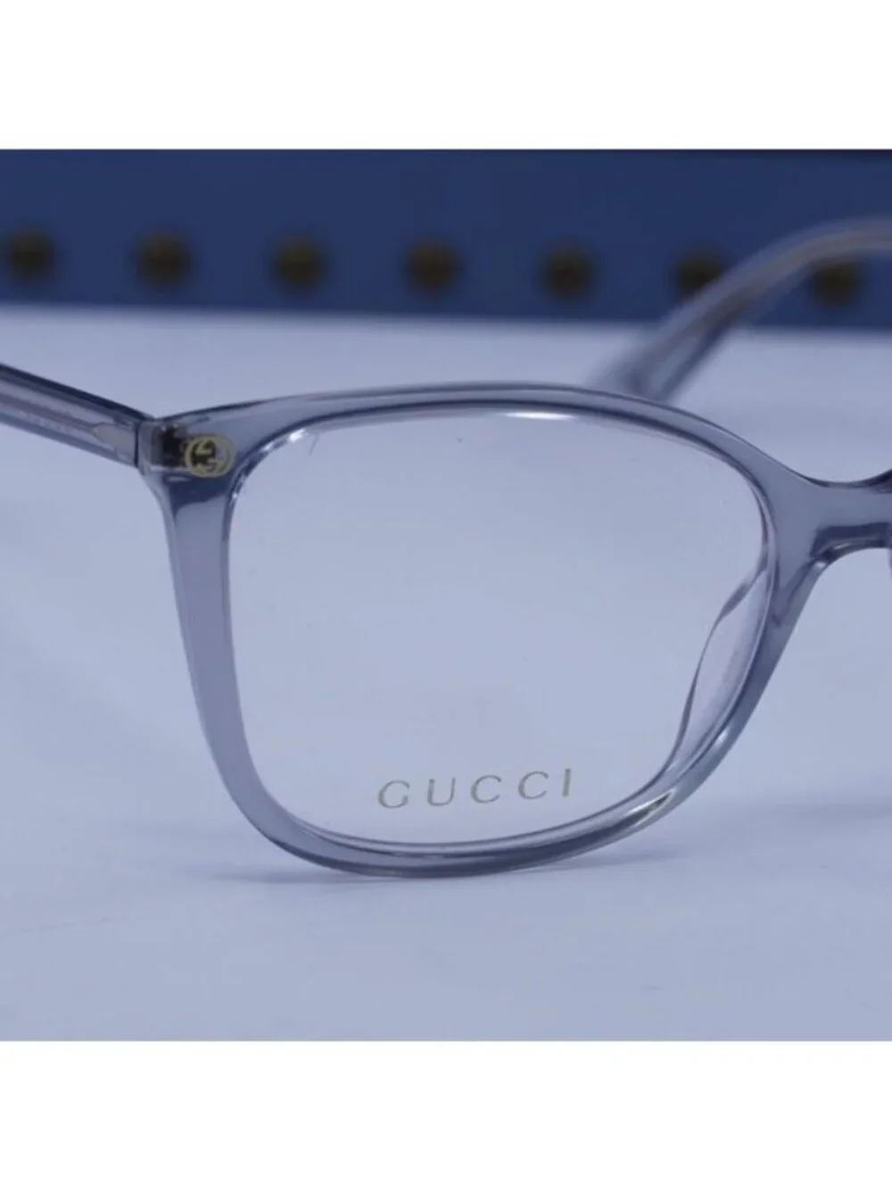 Gucci GG0026O 017 Cat Eye Eyeglasses - Shiny Transparent Denim Blue 53mm